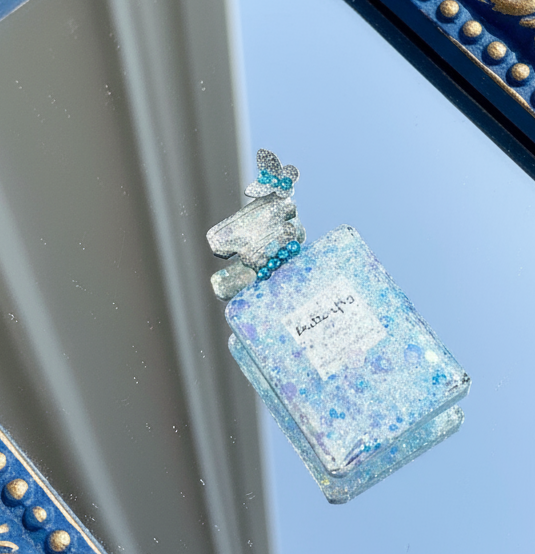 blue perfume bottle embellishment