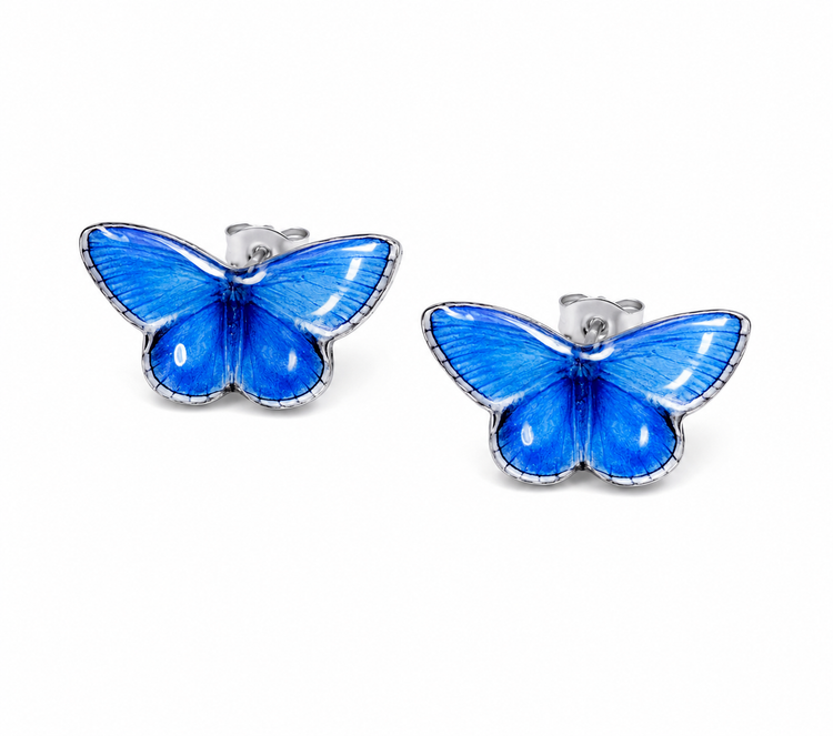 A pair of butterfly-shaped stud earrings with vibrant blue enamel wings