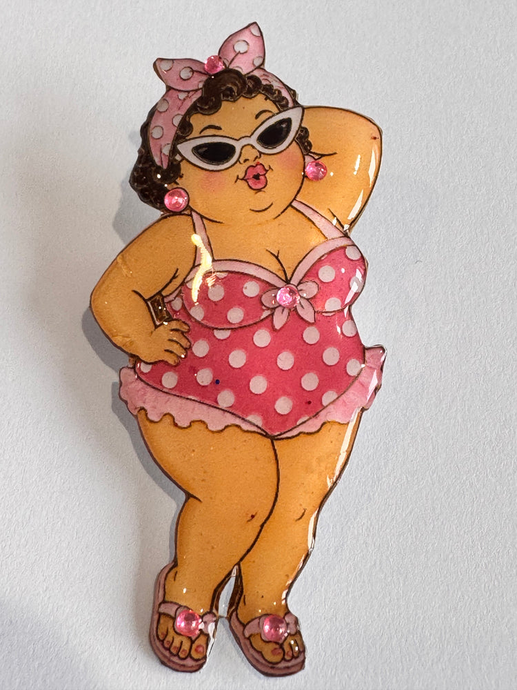 Chubby women in polka dot swimsuit brooch
