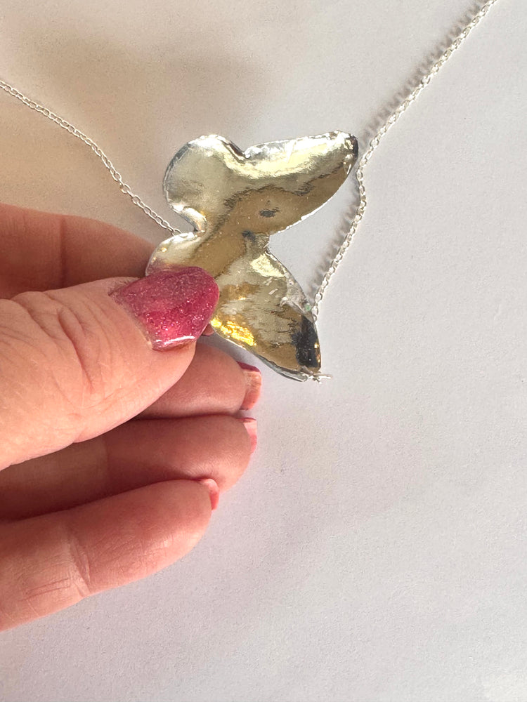 Beautiful blue and silver butterfly earrings and pendant set. Unique