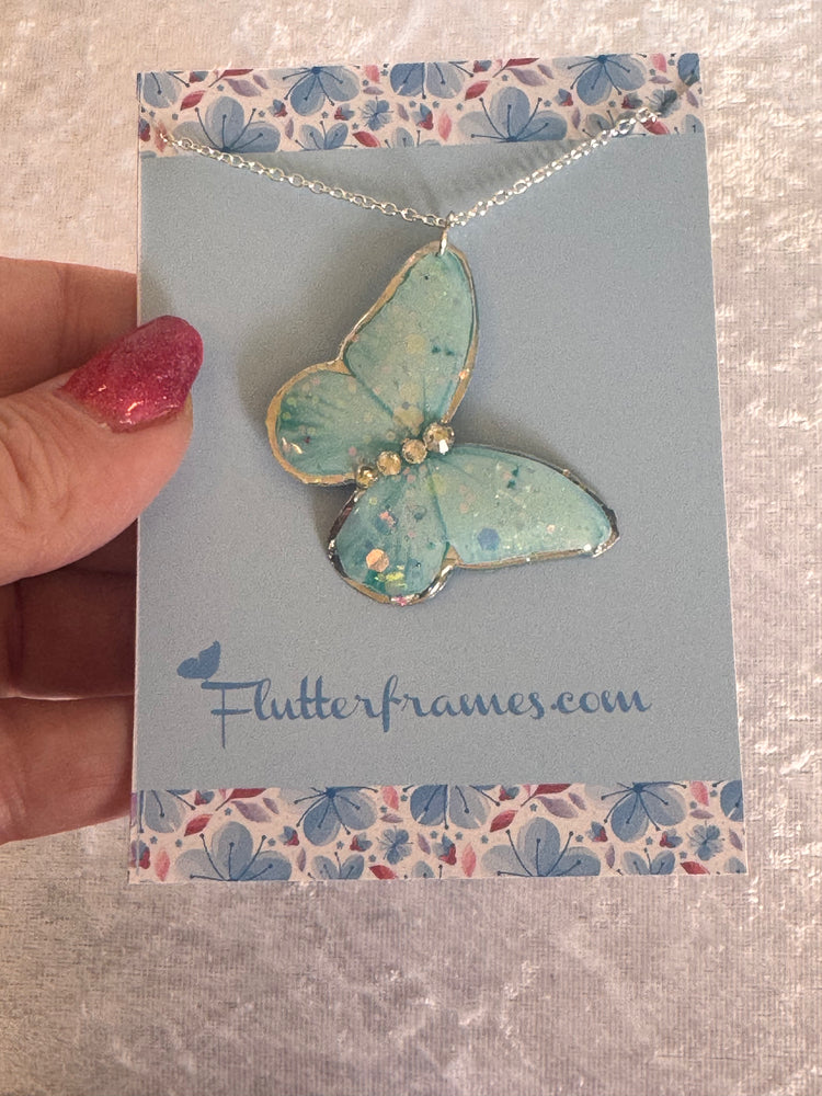 Beautiful rainbow gold butterfly earrings and pendant set. Unique