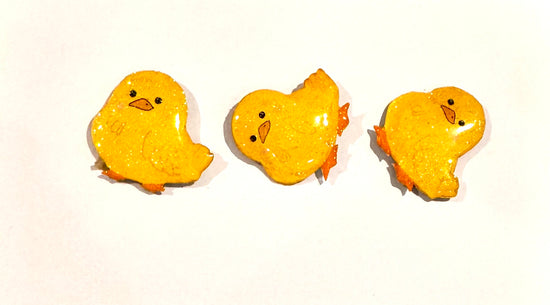 handmade Duck enamel pins.
