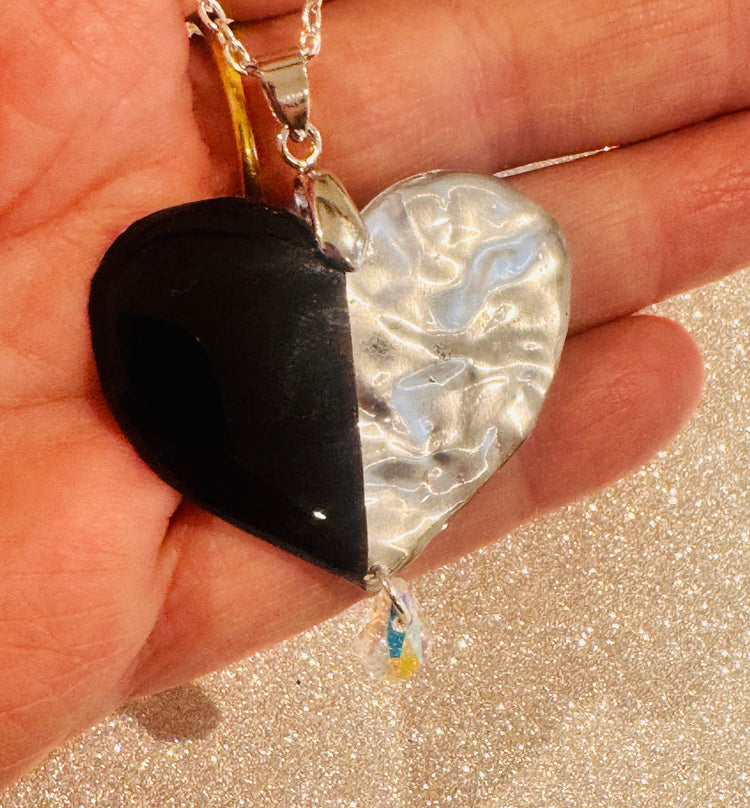 Beautiful handmade black and silver pendant.