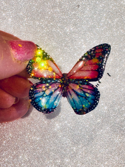 pink and blue glittery enamel butterfly pin
