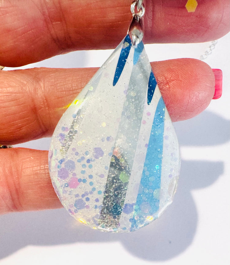 Unique to Flutterframes Recycled silver and blue oval abstract pendant
