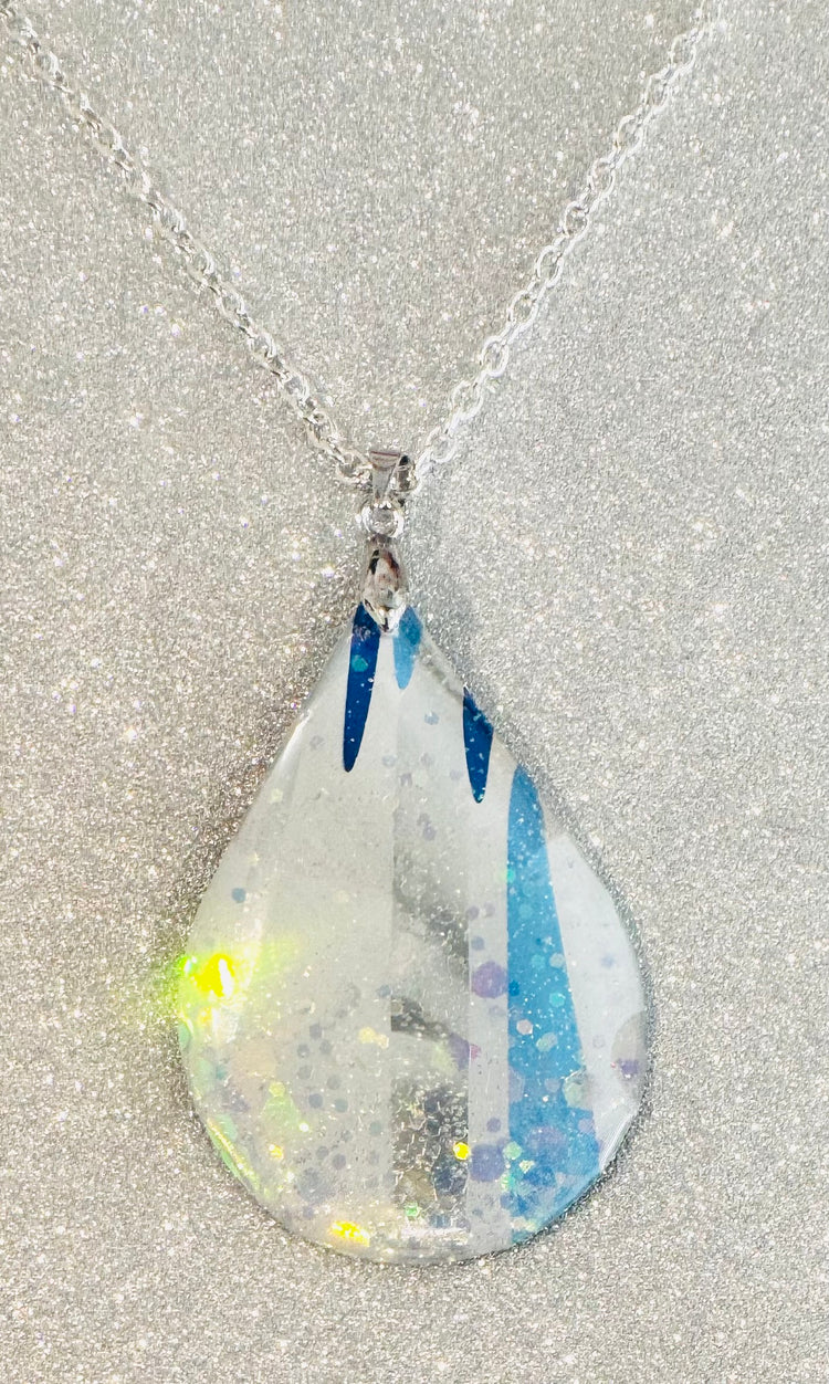 Recycled oval abstract pendant from soda cans