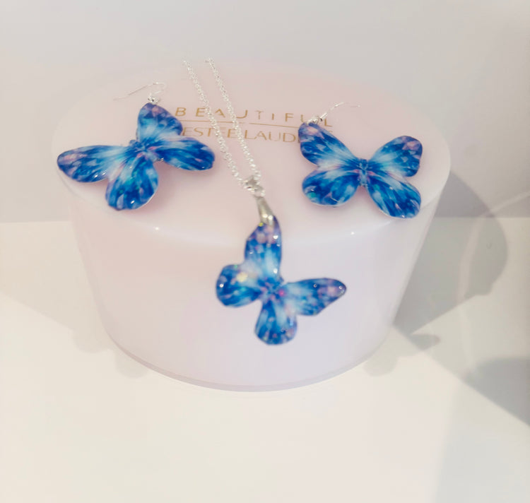 blue and pink handmade butterfly earrings and pendant from tin cans