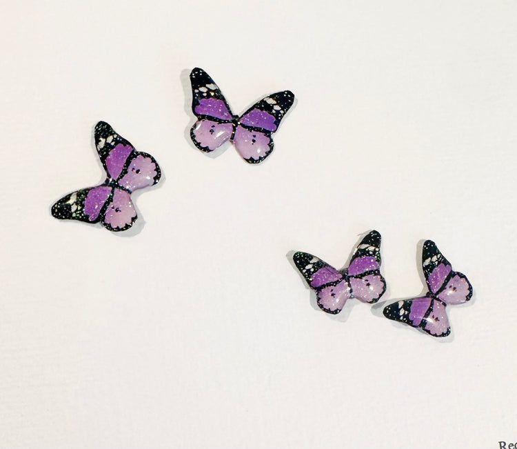 Pretty lilac butterfly stud earrings.