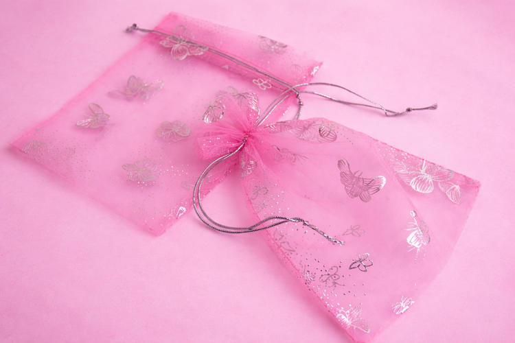 Pink organza bag with silver butterfly designs