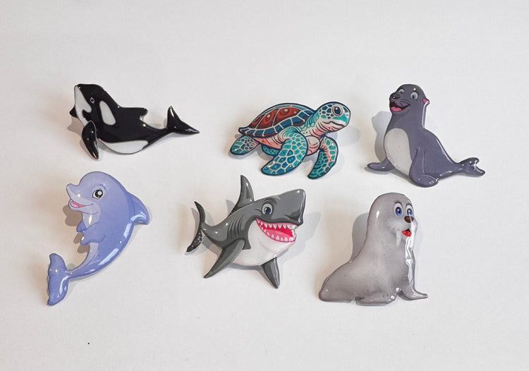 Set of colorful sea animal enamel pins handmade