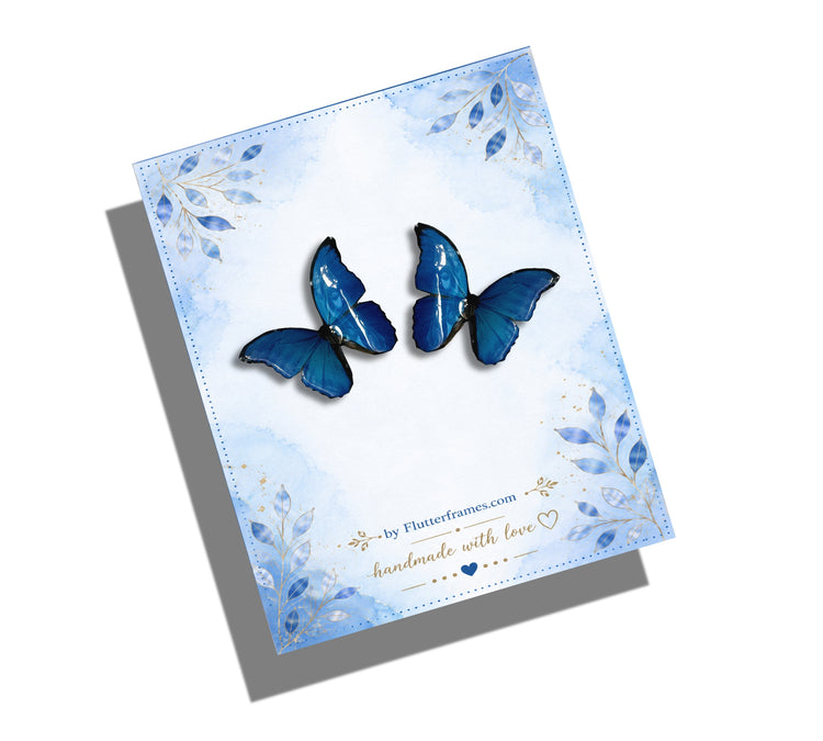 glossy butterfly blue studs by Flutterframes