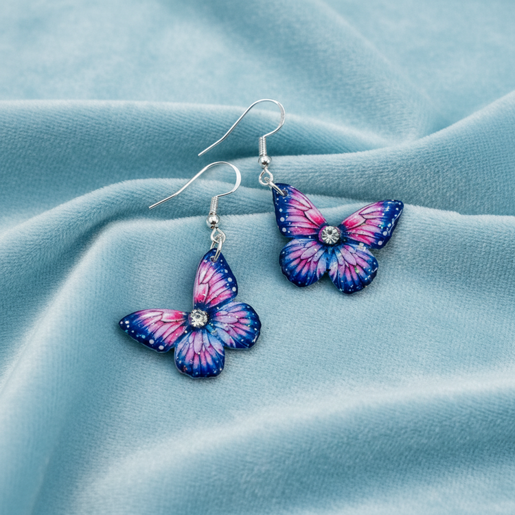 handmade small pink and blue butterfly dangle earrings by Flutterframes