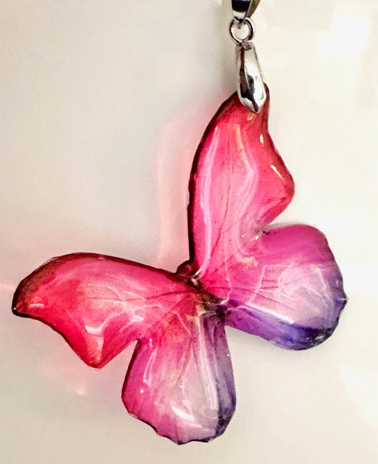 Pink butterfly pendant. They look like real butterflies.Pink butterfly Resin translucent butterfly necklace.Unique.Daughter, friend, gift