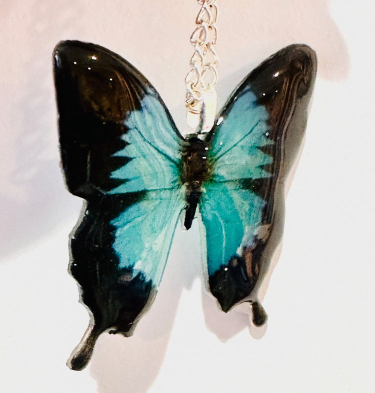 Teal Monarch resin butterfly pendant