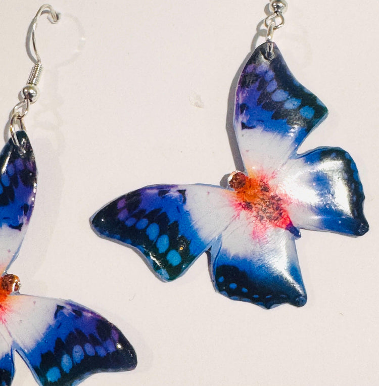 butterfly earrings, handmade from recycled tin cans.