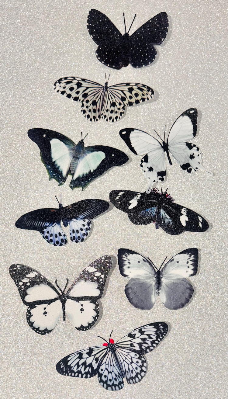 9 Black and white sparkly butterflies.