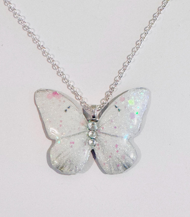 Sparkly white butterfly jewellery. Very unique and chic.