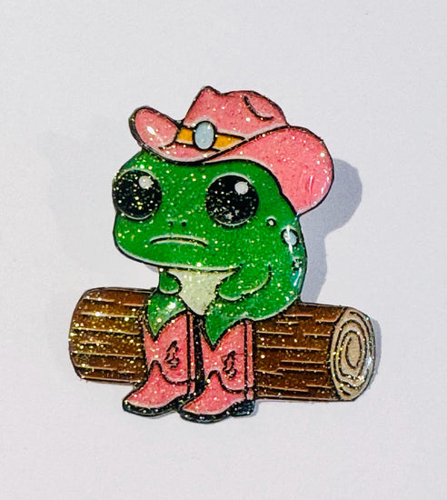 funny green frog. Line dancing. Enamel pin, magnet
