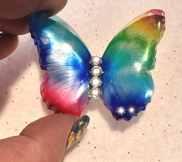 multi-coloured iridescent double butterfly