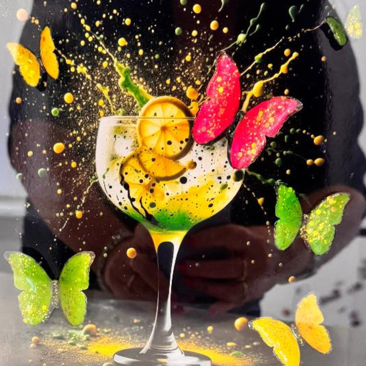 gin and Tonic with glitzy picture with butterflies