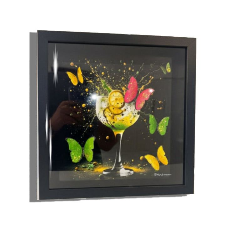 Gin and Tonic. Framed artwork of a colorful cocktail with butterflies on a black background