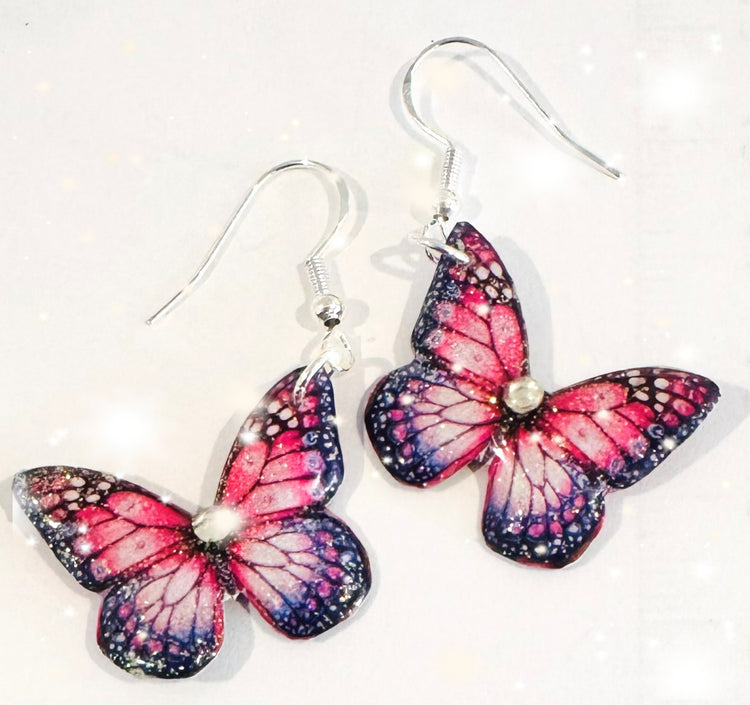 pink handmade butterfly drop earrings from tin cans