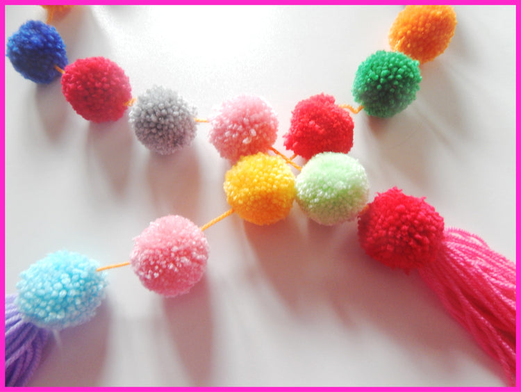 pom pom rainbow garland for birthday parties