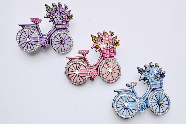 beautiful handmade diamante bicycle brooches/ pins in pink, lilac and blue
