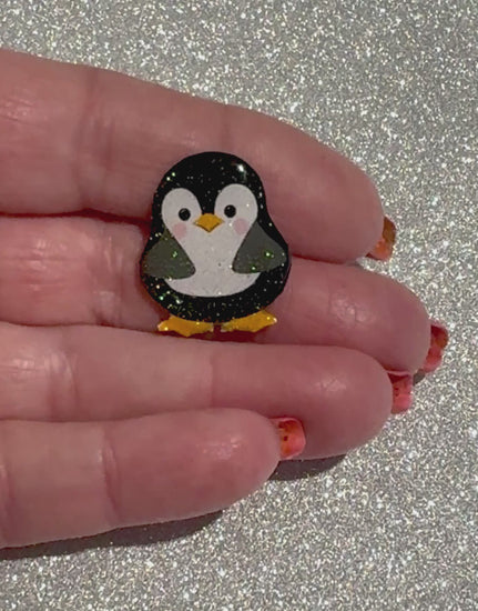 Penguin enamel pin from soda cans