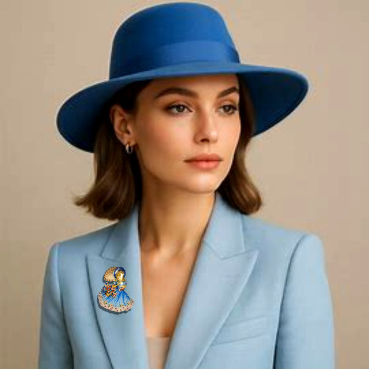 Vintage 1950's Decorative brooch with a girl in a blue dress holding an umbrella made from recycled  tin cans