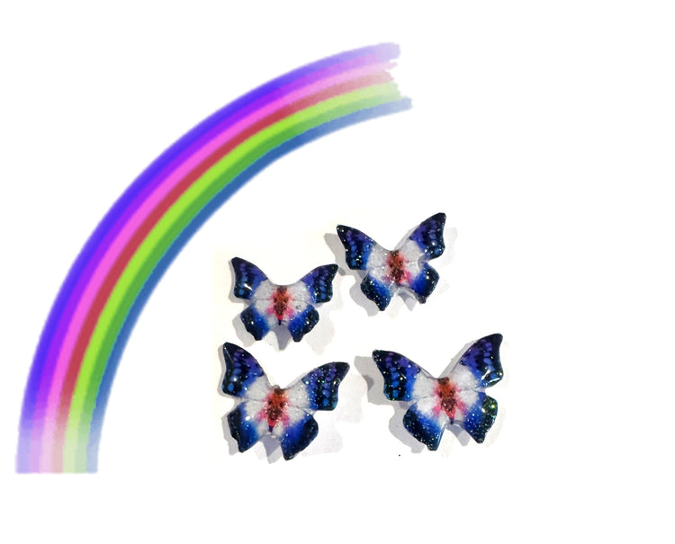 Starburst pink and blue butterfly stud earrings.