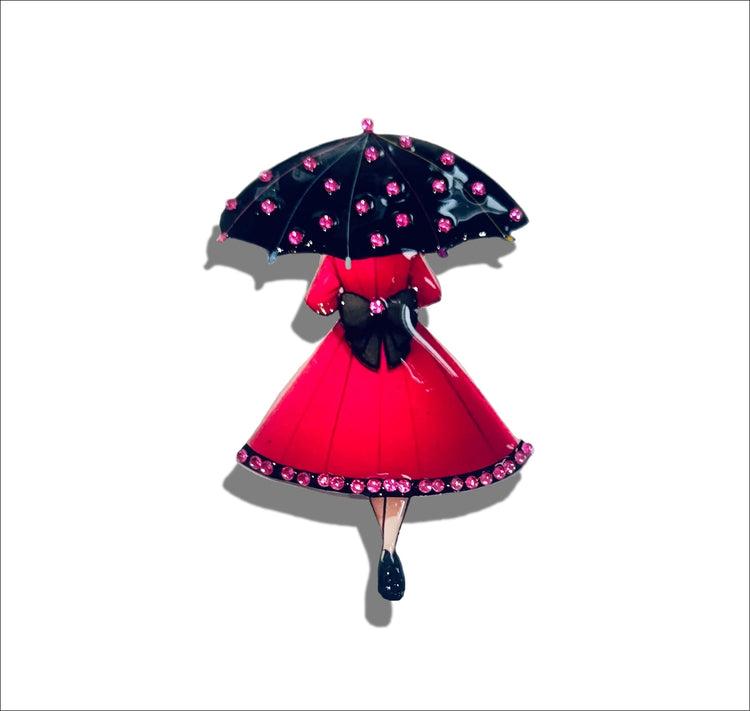 Illustration of a person in a pink dress with a black umbrella