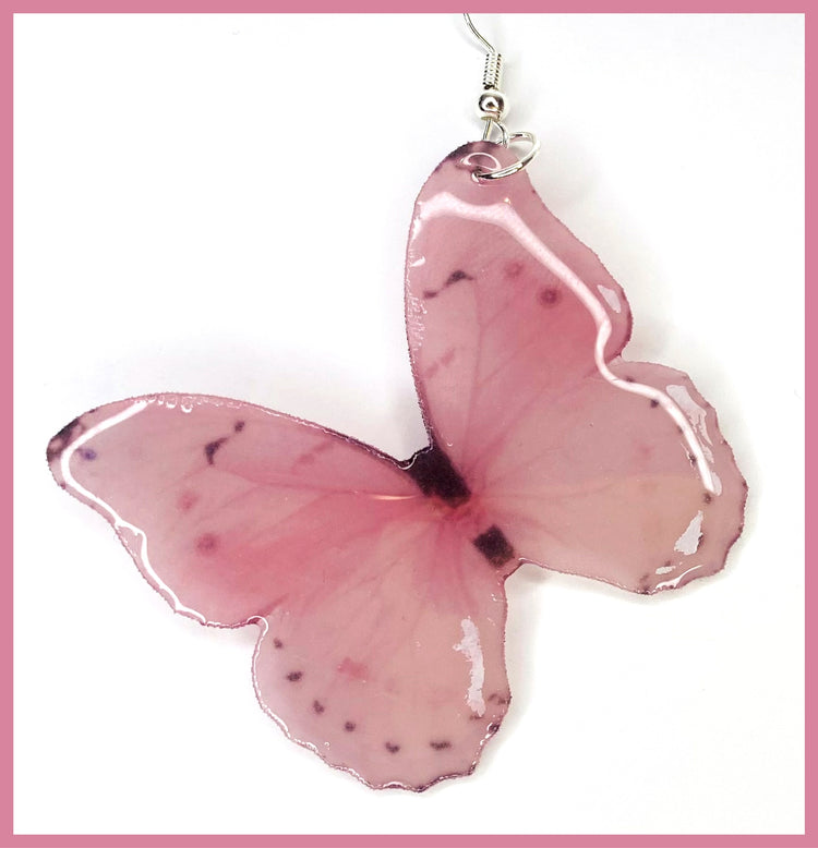 Pink Quirky Butterfly earrings. Resin butterfly earrings, looks like a real butterfly. Pastel pink Dangle butterfly earrings. Quirky