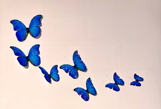 Blue butterflies made from tin cans wall decorations