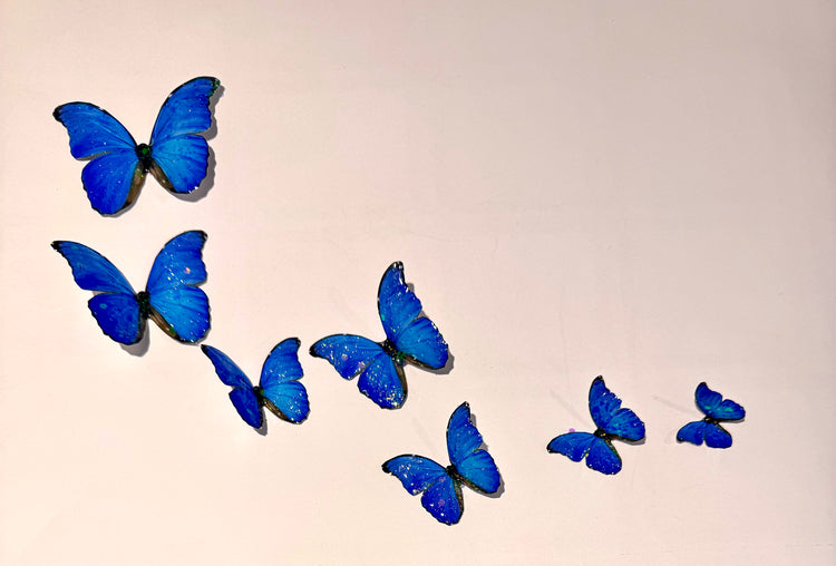 Blue butterflies made from tin cans wall decorations