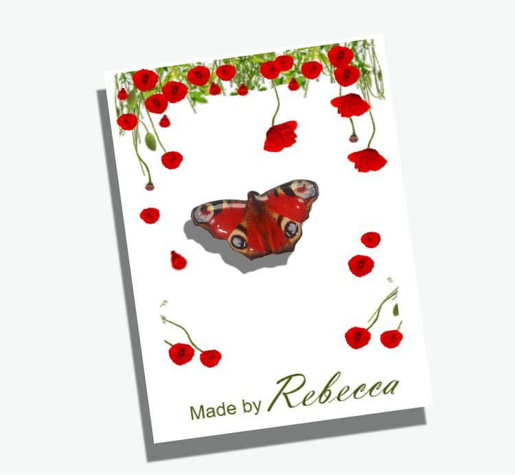 Peacock butterfly enamel pin made from recycled tin cans