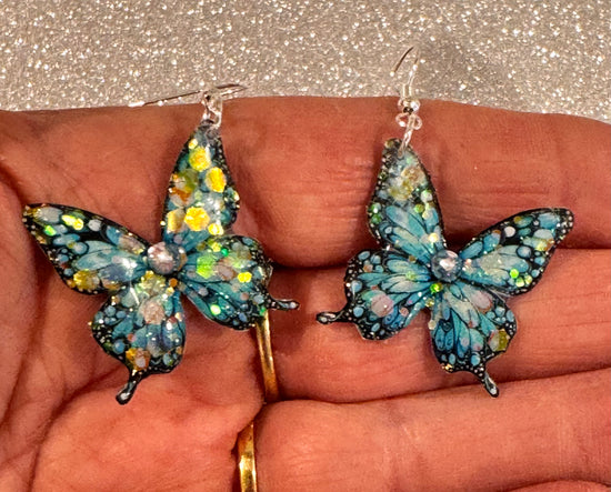Turquoise butterfly drop earrings, handmade from this n cans 
