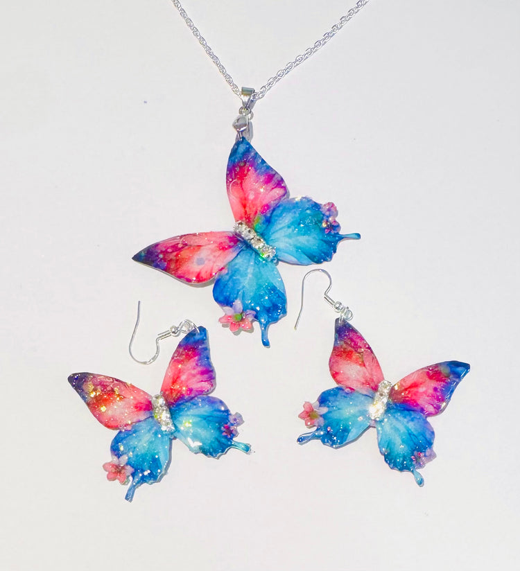 Pink and blue butterfly jewellery set, 