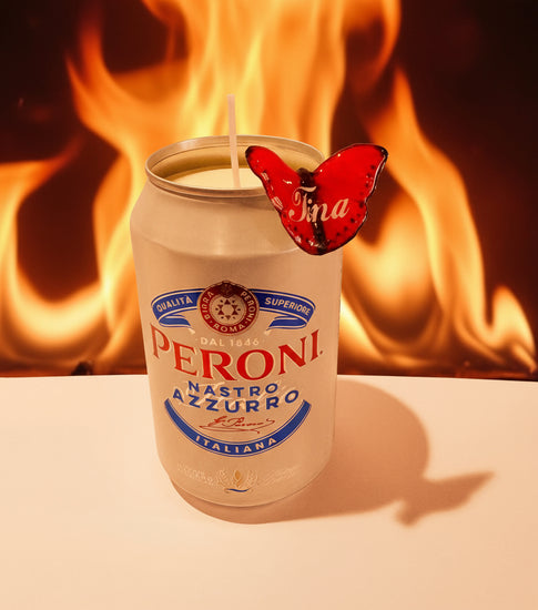 Personalised Peroni beer can candle with a red butterfly on a white background