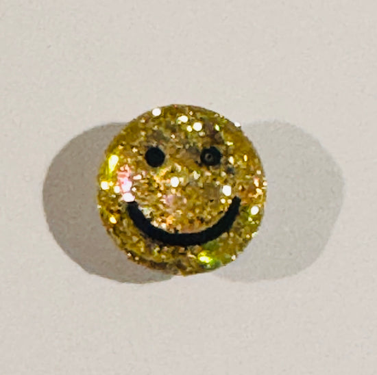Gold glittery smiley face button