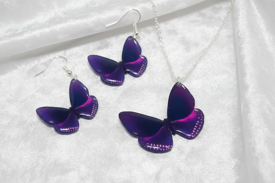 Butterfly-shaped jewellery set with purple butterflies 