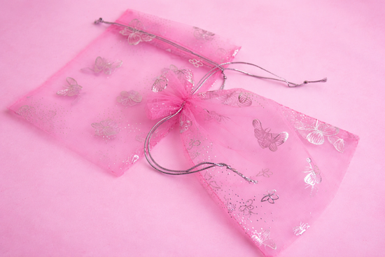 Pink organza bag with silver butterfly designs