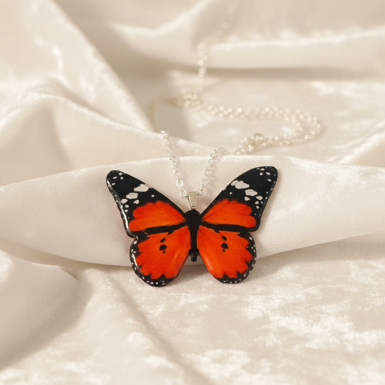 Red butterfly pendant.Lesser Wanderer