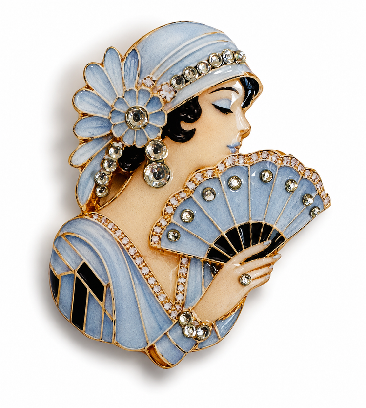Retro woman blue flapper hat and dress, holding a matching fan, with rhinestone handmade brooch