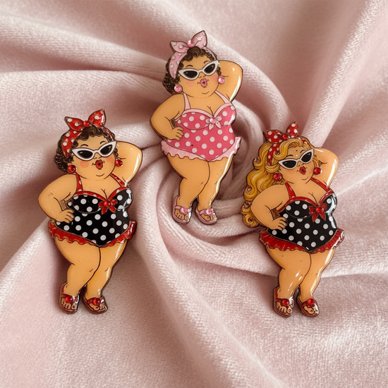 Three vintage-style bikini pin badges