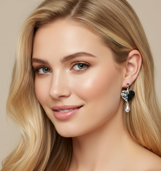 Heart-shaped earrings with clear and black heart design