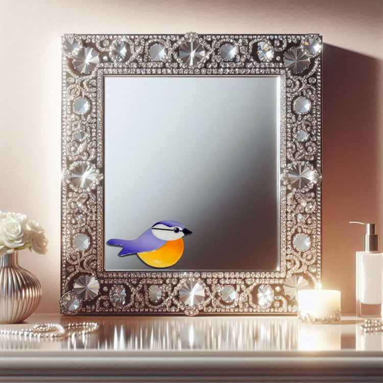 Decorative mirror with a blue tit bird