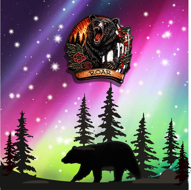 A bear-themed enamel pin or badge shown against a colorful aurora-style background 
