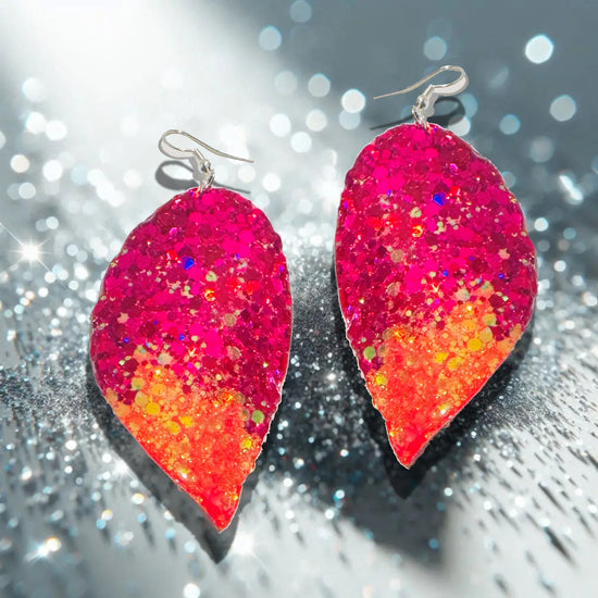Pair of pink and orange glittery earrings 