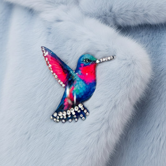 Colourful hummingbird brooch with rhinestone accents